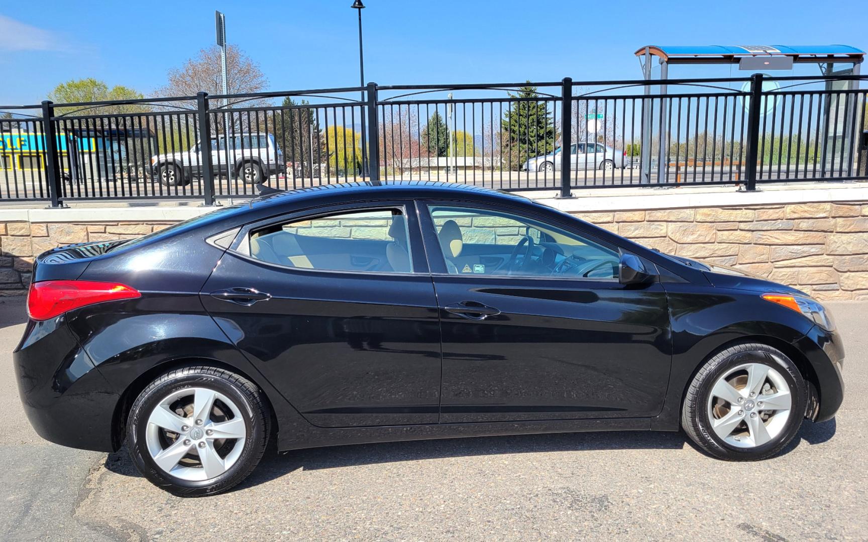 2013 Black /Tan Hyundai Elantra GLS (KMHDH4AE8DU) with an 1.8L I4 engine, 6 Speed Auto transmission, located at 450 N Russell, Missoula, MT, 59801, (406) 543-6600, 46.874496, -114.017433 - Low Mile Front Wheel Drive Sedan. One Owner. Excellent Fuel Economy. 1.8L I4 Engine. 6 Speed Automatic Transmission. AirConditioning. Power Windows and Locks. Bluetooth. - Photo#0